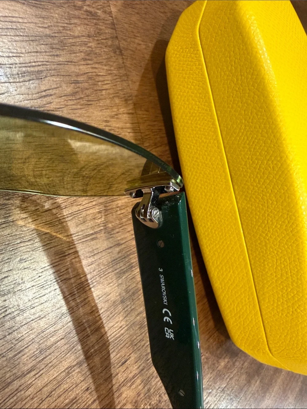Swarovski Sunglasses with Green lenses and crystals on each stem